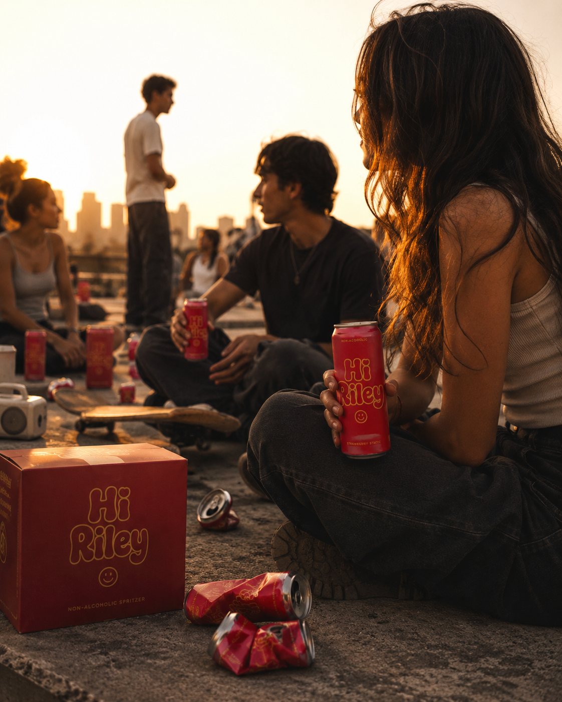 People enjoying HI RILEY non-alcoholic spritzers at golden hour